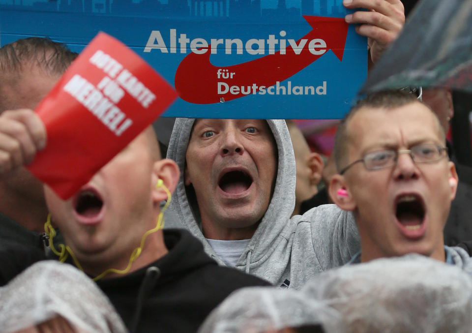 Supporters of the hard-right Alternative for Germany (AfD) party shout slogans during an election campaign rally of German Chancellor Angela Merkel. (Photo: Reinhard Krause / Reuters)