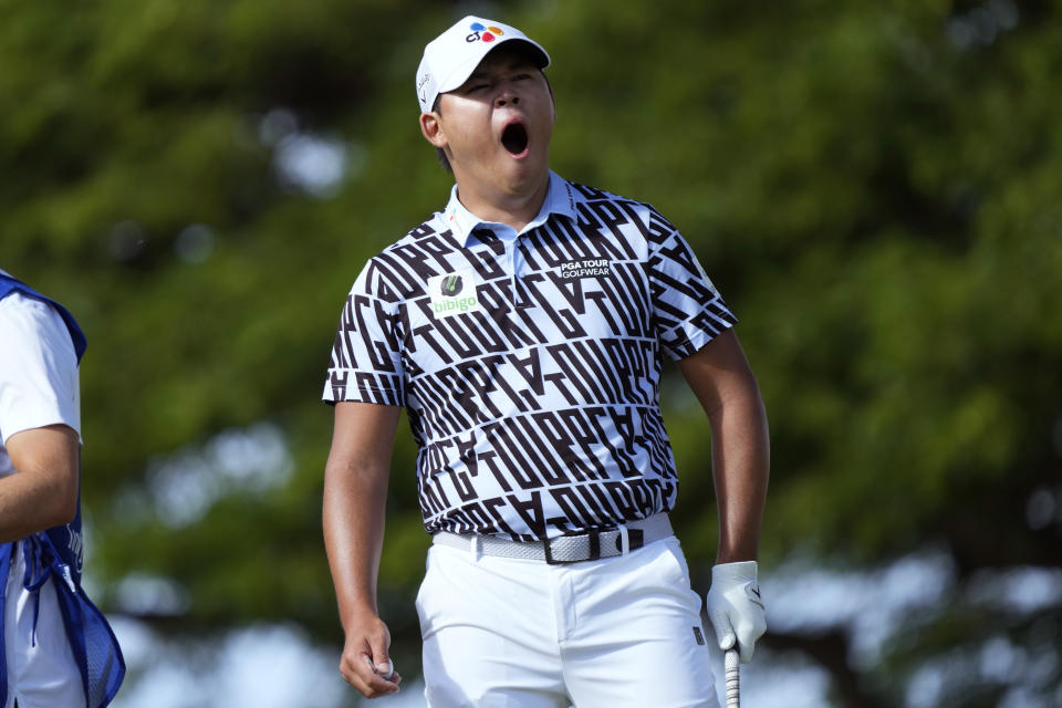 Si Woo Kim yawns on the second tee during the final round of the Sony Open golf tournament, Sunday, Jan. 15, 2023, at Waialae Country Club in Honolulu. (AP Photo/Matt York)