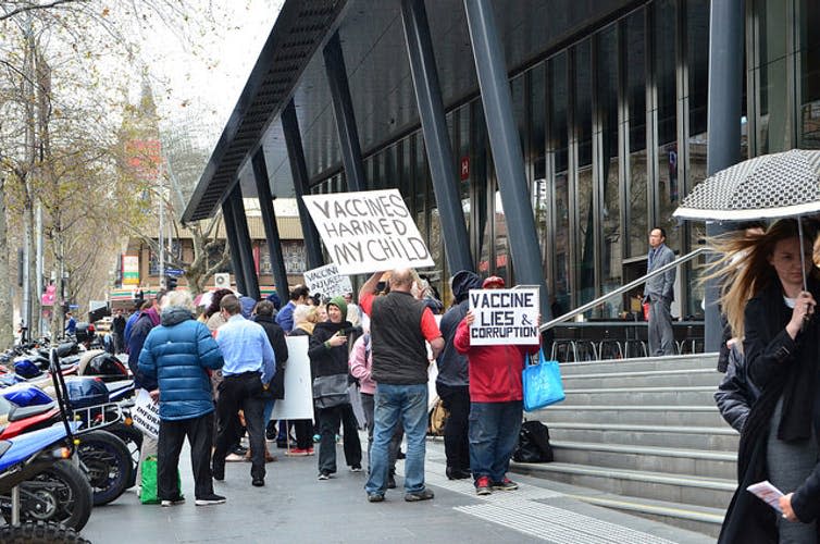 <span class="caption">Anti-vaxxers protesting outside a court in Melbourne, Australia.</span> <span class="attribution"><a class="link " href="https://www.flickr.com/photos/avlxyz/37217852115/in/photolist-r2B3f1-snnmyY-YGPeQZ-YGPdMr-LgSnKd" rel="nofollow noopener" target="_blank" data-ylk="slk:Alpha/Flickr;elm:context_link;itc:0;sec:content-canvas">Alpha/Flickr</a>, <a class="link " href="http://creativecommons.org/licenses/by-nc/4.0/" rel="nofollow noopener" target="_blank" data-ylk="slk:CC BY-NC;elm:context_link;itc:0;sec:content-canvas">CC BY-NC</a></span>