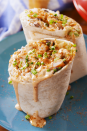 <p>Ready to upgrade your typical burrito fillings game? We took all the flavors of our favorite <a href="https://www.delish.com/cooking/recipe-ideas/a35591174/shrimp-po-boy-recipe/" rel="nofollow noopener" target="_blank" data-ylk="slk:shrimp Po'Boy sandwich;elm:context_link;itc:0;sec:content-canvas" class="link ">shrimp Po'Boy sandwich</a> and now we'll never go back to our regular ol' chicken and bean burritos! </p><p>Get the <strong><a href="https://www.delish.com/cooking/recipe-ideas/a26593929/old-bay-shrimp-burritos-recipe/" rel="nofollow noopener" target="_blank" data-ylk="slk:Old Bay Shrimp Burritos recipe;elm:context_link;itc:0;sec:content-canvas" class="link ">Old Bay Shrimp Burritos recipe</a>. </strong> </p>