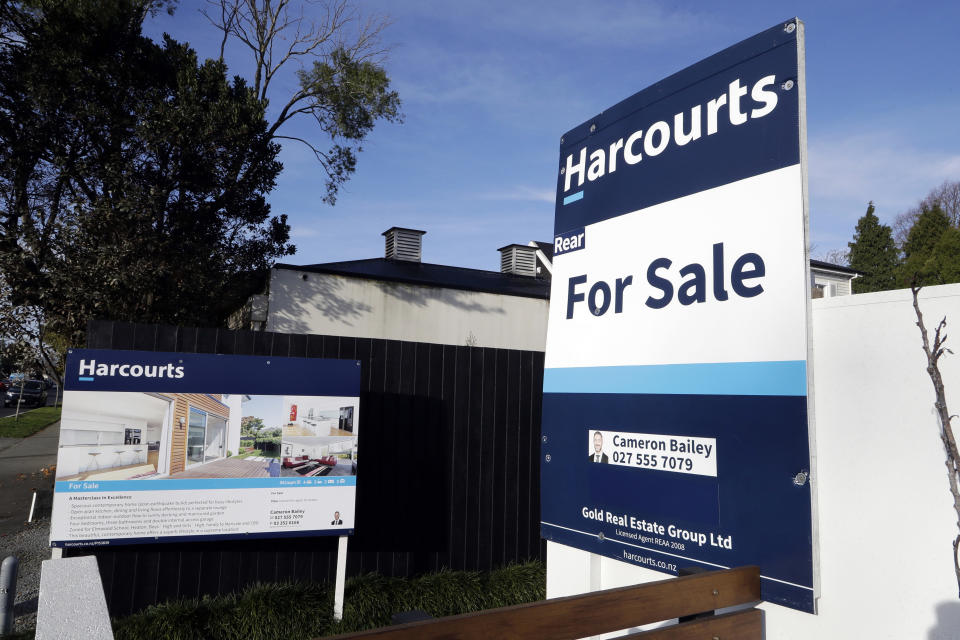 FILE - In this Aug. 13, 2018, file photo, a house is pictured for sale in Christchurch, New Zealand. New Zealand will spend billions of dollars to encourage more home building and will also remove some tax breaks for speculators as it tries to slow skyrocketing house prices. The government on Tuesday, March 23, 2021, announced a series of new measures to address what Prime Minister Jacinda Ardern is describing as a crisis. (AP Photo/Mark Baker, File)