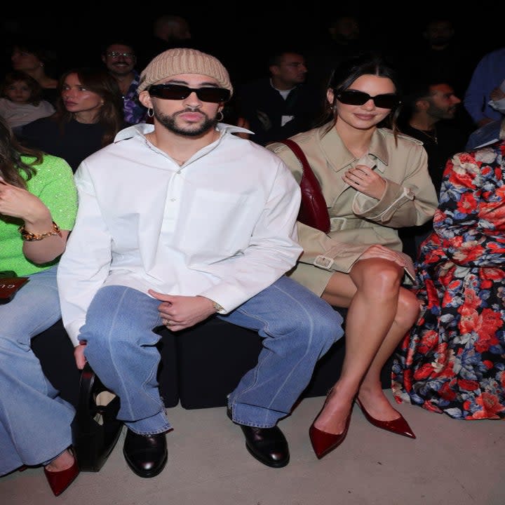 closeup of benito and kendall sitting at a fashion show