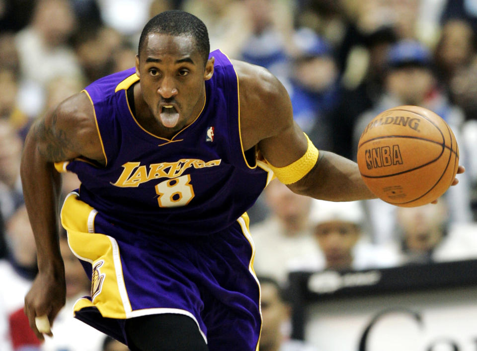 Los Angeles Lakers' Kobe Bryant dribbles the ball against the Washington Wizards during the second quarter in an NBA basketball game, Monday, Dec. 26, 2005, in Washington. (AP Photo/Evan Vucci)