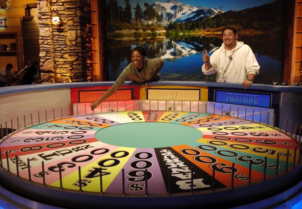 wheel of fortune set, with a multi coloured wheel that contestants spin