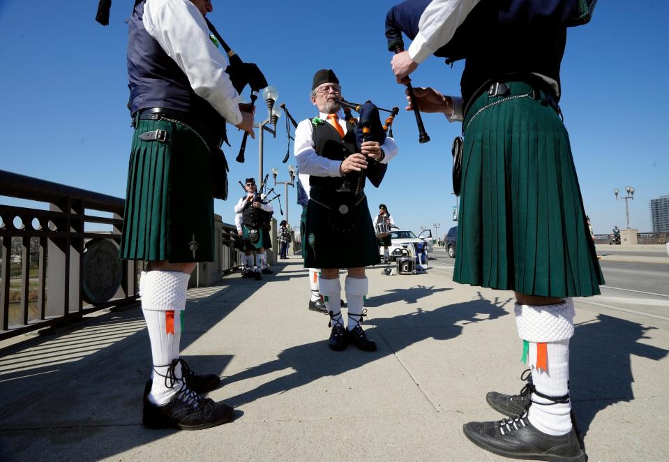 The Shamrock Club of Columbus Pipes & Drums before marching in the St. Patrick's Day parade through downtown in 2022