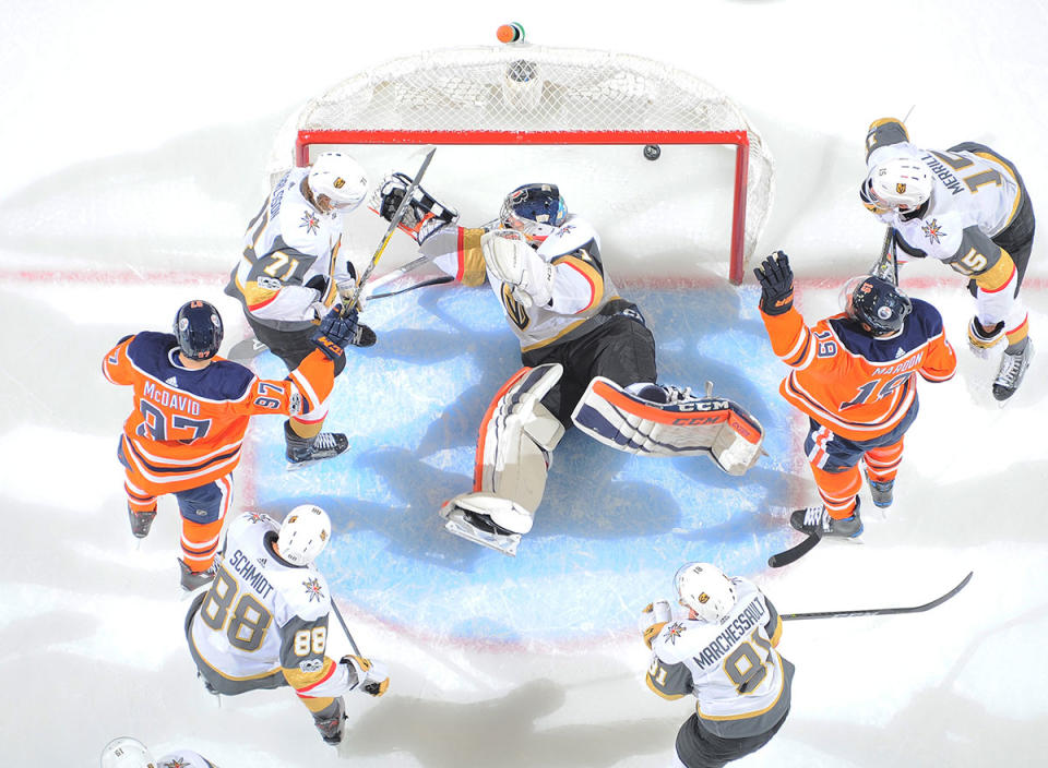 Patrick Maroon and Connor McDavid celebrate after scoring a goal on Dylan Ferguson. (Andy Devlin/NHLI via Getty Images)