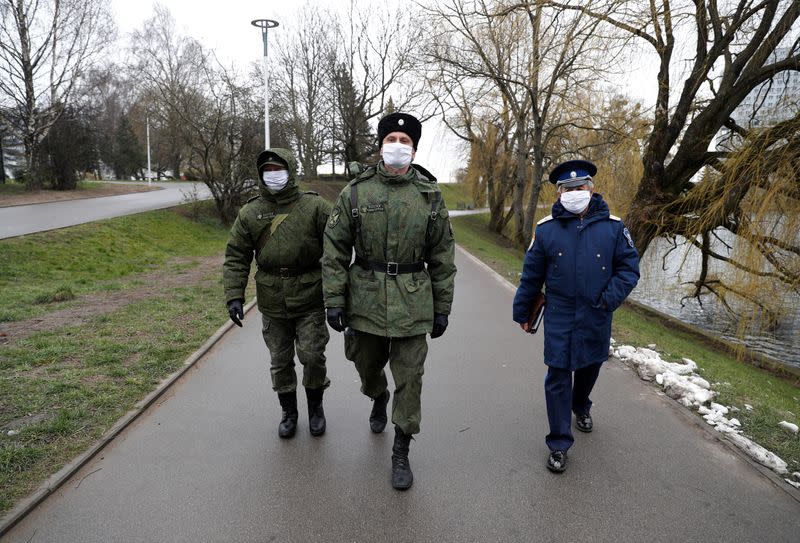 Cossacks wear SilverMask reusable face masks as they patrol the streets in Kaliningrad