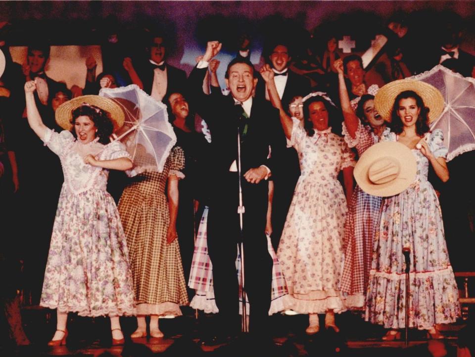 Ridge Bond, center, on March 30, 1993, belts out the song "Oklahoma" with the help of cast and choir from the University of Central Oklahoma production of the iconic musical "Oklahoma!"