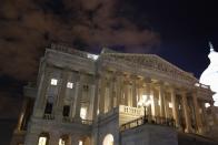 The U.S. House of Representatives remains fully lit during a rare late-night Saturday session at the U.S. Capitol in Washington, September 28, 2013. The U.S. government edged closer on Saturday to a shutdown as Republicans in the House of Representatives rejected an emergency spending bill approved by the Senate and pushed instead for a one-year delay of President Barack Obama's healthcare reform law. REUTERS/Jonathan Ernst