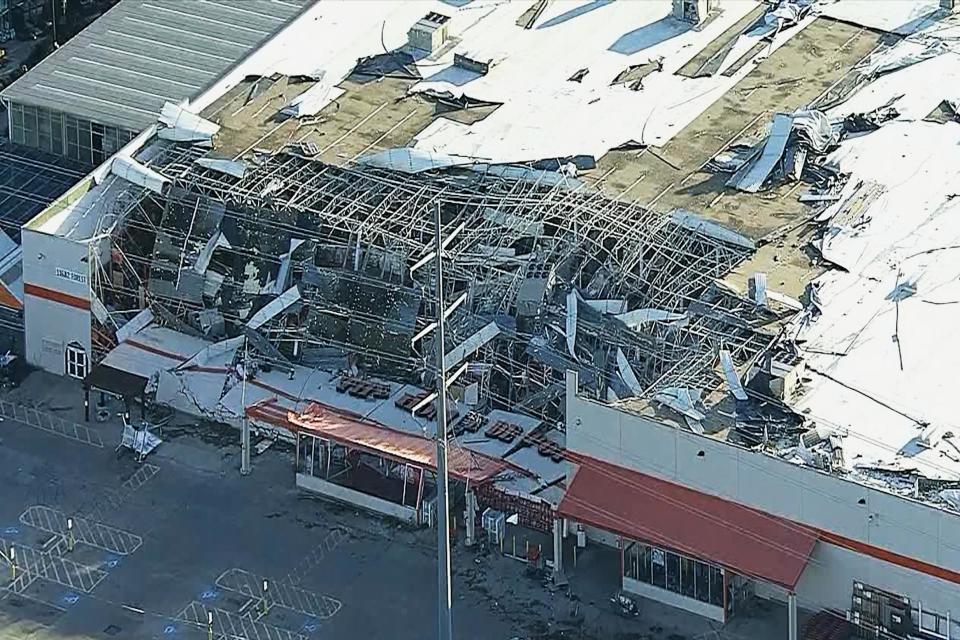 Storm damage to a Home Depot store in Dallas on Monday (AP)