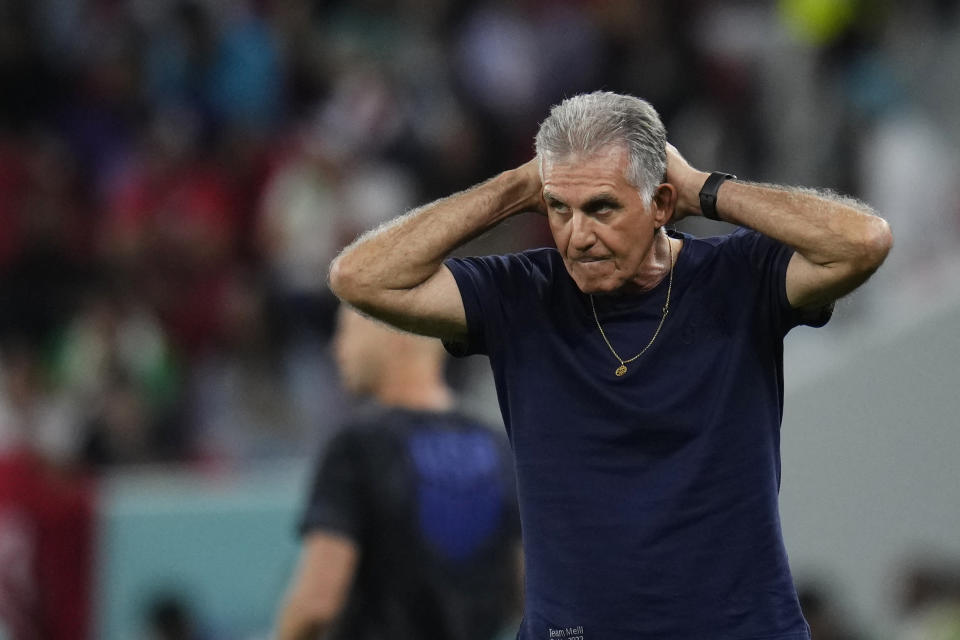 Iran's head coach Carlos Queiroz grimaces during the World Cup group B soccer match between Iran and the United States at the Al Thumama Stadium in Doha, Qatar, Tuesday, Nov. 29, 2022. (AP Photo/Manu Fernandez)
