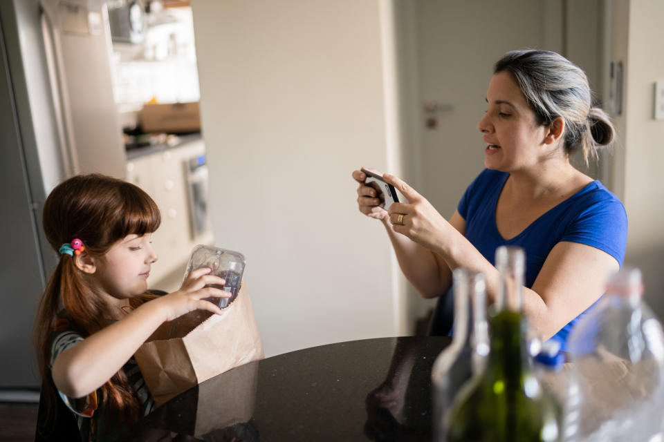 mom filming their daughter