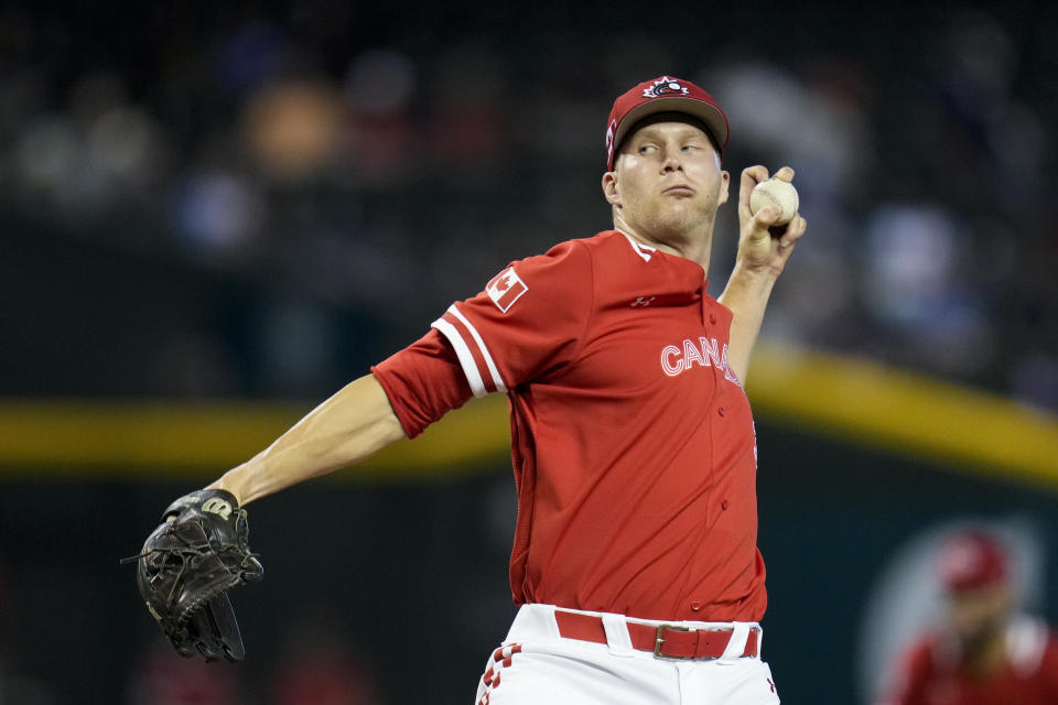 Canada pitcher Evan Rutckyj throws against Great Britain during the fourth inning of a World Baseball Classic game in Phoenix, Sunday, March 12, 2023. (AP Photo/Godofredo A. Vásquez)