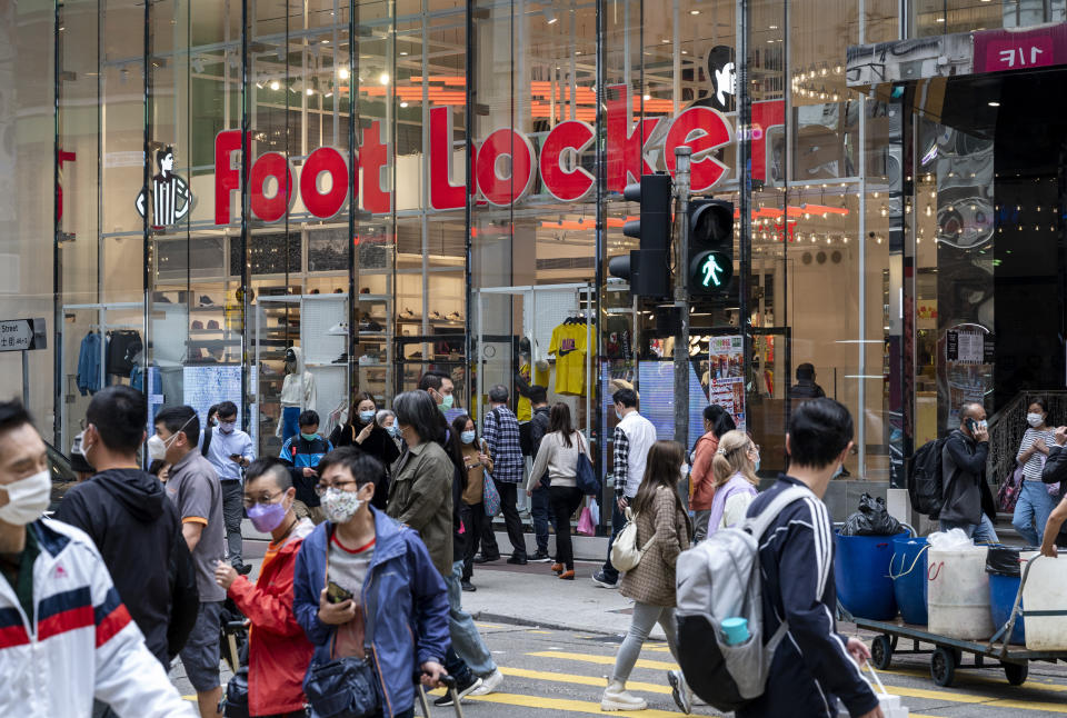 HONG KONG, CHINA - 2021/04/18: Shoppers walk past the American multinational sportswear and footwear retailer, Foot Locker store in Hong Kong. (Photo by Budrul Chukrut/SOPA Images/LightRocket via Getty Images)