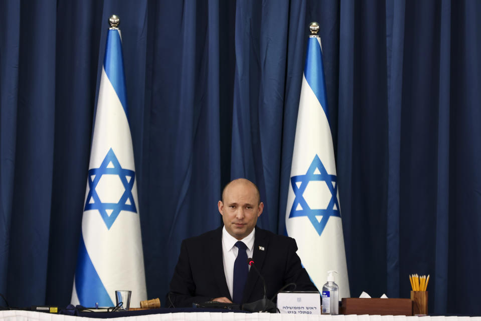 Israeli Prime Minister Naftali Bennett chairs at the weekly cabinet meeting at the Foreign Ministry in Jerusalem, Sunday, Aug. 8, 2021. (Ronen Zvulun/Pool via AP)