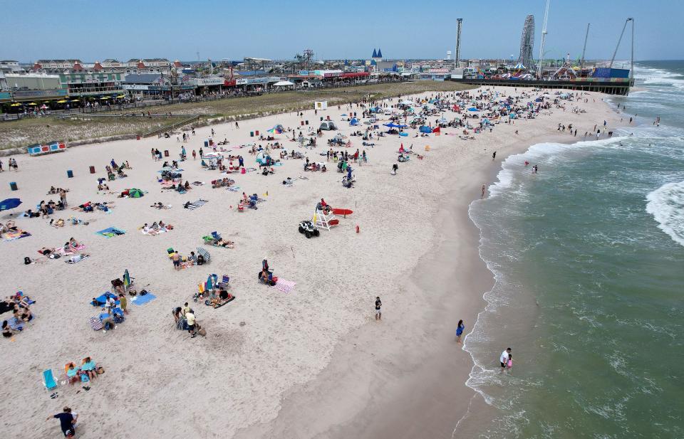 Beachgoers spend the day in Seaside Heights.
