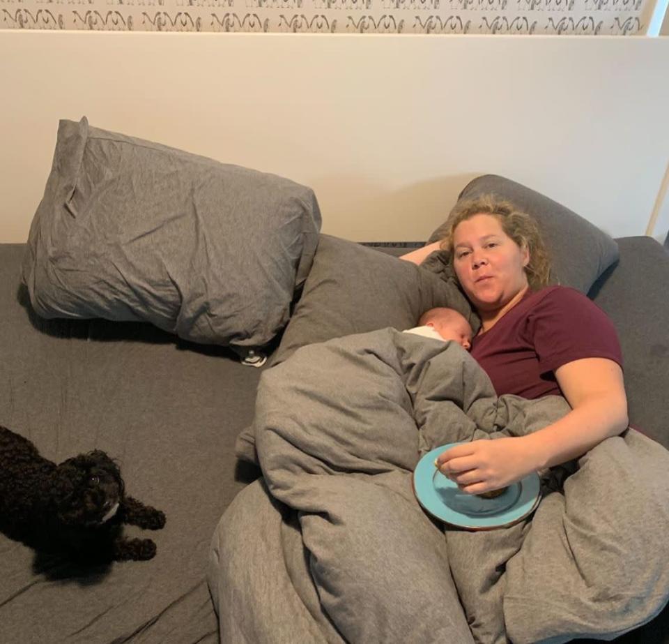 Amy Schumer shared this photo of her at home with newborn son Gene. (Photo: Instagram via Amy Schumer)