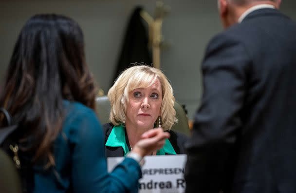 PHOTO: Rep. Andrea Reeb talks with people on the floor of the New Mexico House of Representatives before the start of a session, Feb. 1, 2023, in Santa Fe, New Mexico. (Albuquerque Journal via Zuma Press)