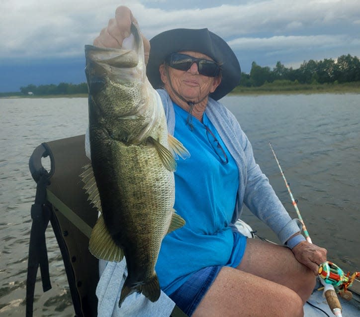 Roberta Childress, of Frostproof, caught this 7-pound largemouth bass on a live shiner while fishing at Lake Clinch with her husband, Jim Childress of Big Bass Bait & Tackle this week.