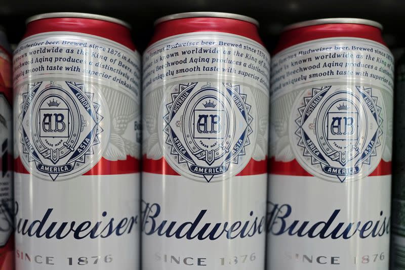 Cans of Budweiser beer are displayed on a supermarket shelf in Shanghai