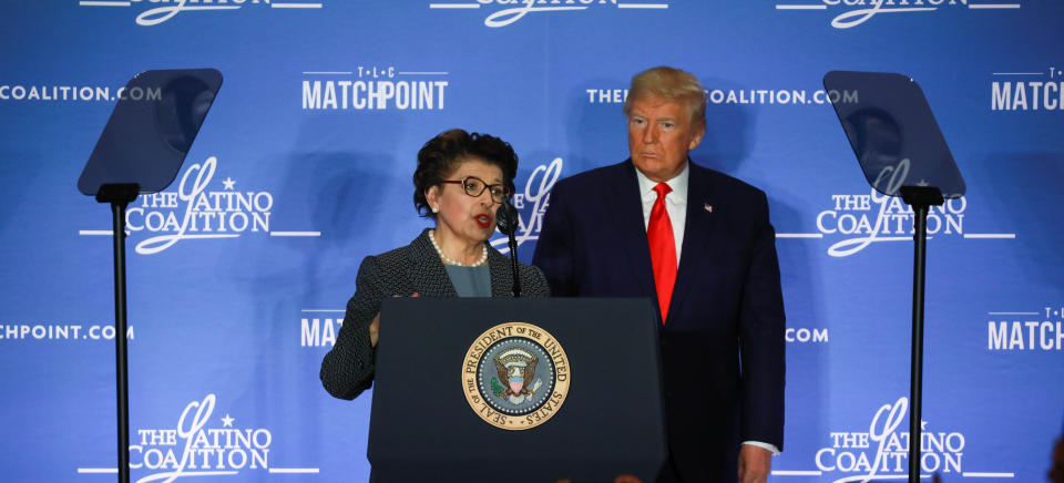 WASHINGTON, USA - MARCH 04: Administrator of the U.S. Small Business Administration (SBA), Jovita Carranza (L) speaks beside United States President Donald Trump (R) at the annual Latino Coalition Legislative Summit on March 4, 2020 in Washington, DC, United States. (Photo by Yasin Ozturk/Anadolu Agency via Getty Images)