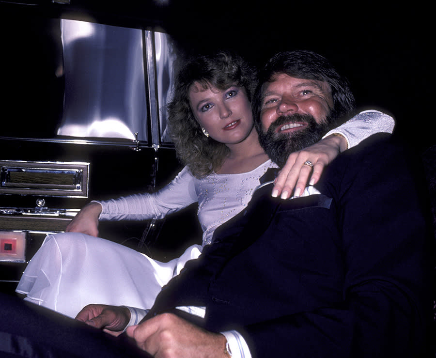 Glen Campbell and Tanya Tucker attend Glen Campbell Golf Tournament Dinner Gala on Feb. 17, 1981. at the Century Plaza Hotel in Century City, California.