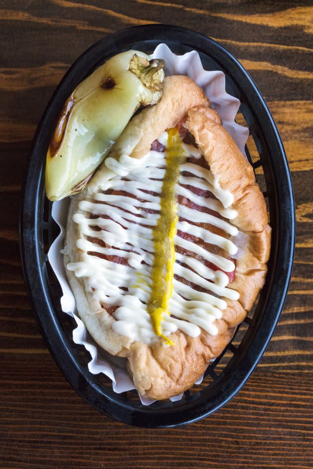 The Sonoran Dog is placed on a bolillo bun. (Photo: Jackie Alpers via Getty Images)