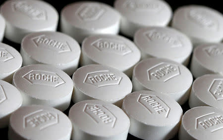 FILE PHOTO: Roche tablets are seen in this photo illustration, January 18, 2016. REUTERS/Dado Ruvic/Illustration/File Photo