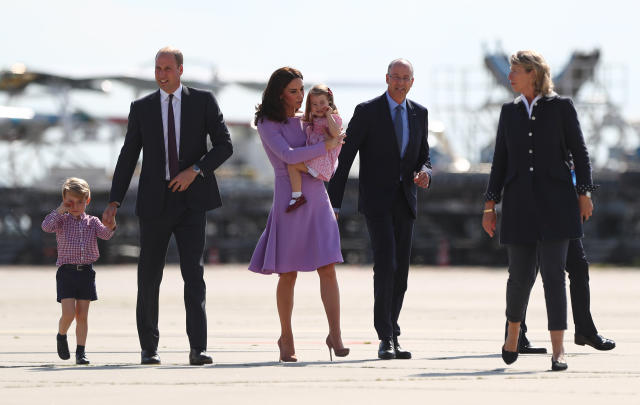 Great Britain's Prince William and Duchess Kate look at an Airbus helicopter with their children George and Charlotte, guided by the CEO of Airbus, Wolfgang Schoder (2-R) in Hamburg, Germany, 21 July 2017. Hamburg is the last leg of the royal couple's Germany visit. Photo: Christian Charisius/dpa (Photo by Christian Charisius/picture alliance via Getty Images)