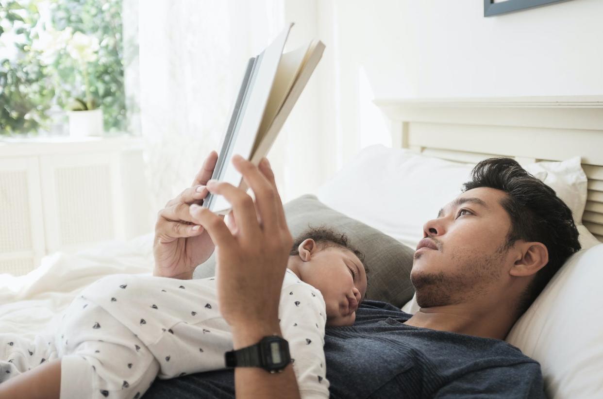 <span class="caption">Evidence-based and easy to read are two important criteria.</span> <span class="attribution"><a class="link " href="https://www.gettyimages.com/detail/photo/father-reading-with-sleeping-baby-son-royalty-free-image/601800815" rel="nofollow noopener" target="_blank" data-ylk="slk:JGI/Tom Grill/Tetra images via Getty Images;elm:context_link;itc:0;sec:content-canvas">JGI/Tom Grill/Tetra images via Getty Images</a></span>