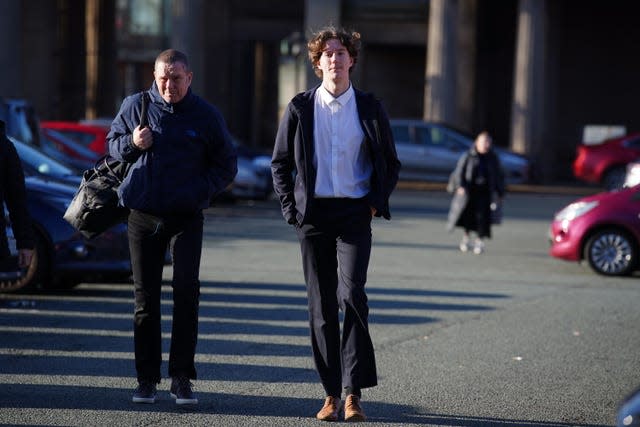 Matthew Turner, right, arrives at Chester Crown Court to be sentenced for the theft of watches belonging to the Duke of Westminster