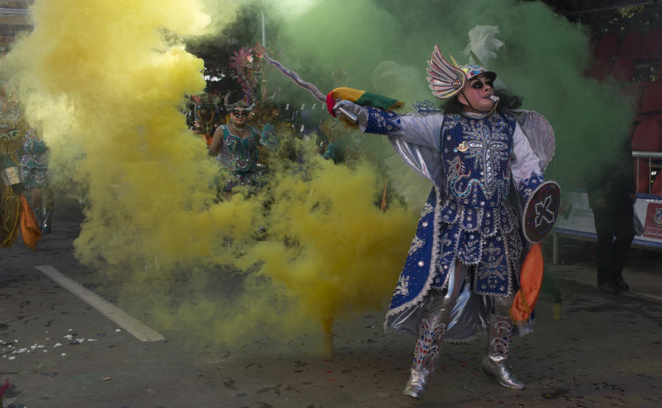 Dancers perform the traditional "Diablada" or Dance of the Devils during the Carnival in Oruro, Bolivia, Saturday, March 2, 2019. The unique festival features spectacular folk dances, extravagant costumes, beautiful crafts, lively music, and up to 20 hours of continuous partying with lots of tourists, drawing crowds of up people annually. (AP Photo/Juan Karita)