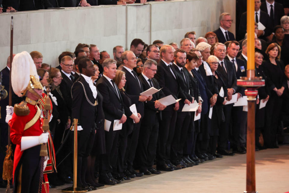 The congregation stuck to an all black dress code as the coffin of the Queen arrived at Westminster Hall from Buckingham Palace for her lying in state. (Getty Images)