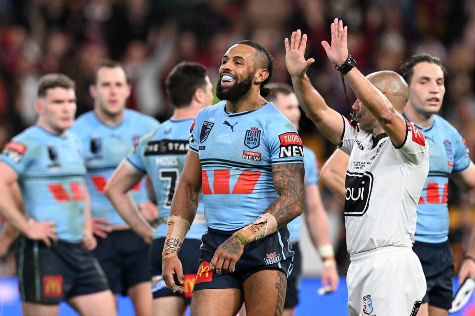 Josh Addo-Carr is sent to the sin-bin by referee Ashley Klein.