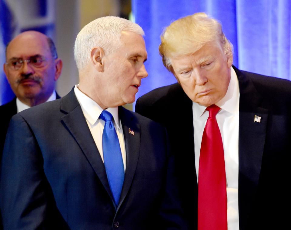President-elect Donald Trump, Vice President-elect Mike Pence and Allen Weisselberg, chief financial officer of The Trump Organization, on Jan. 11, 2017,  in New York.