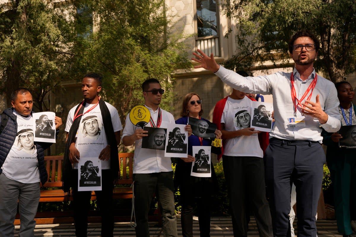 File. Activists hold a demonstration for jailed Egyptian activists Alaa Abdel-Fattah and Mohamed al-Siddiq in 2023. A mass trial in the UAE of dissidents ended on 10 July 2024 with dozens of people sentenced to life in prison (AP)