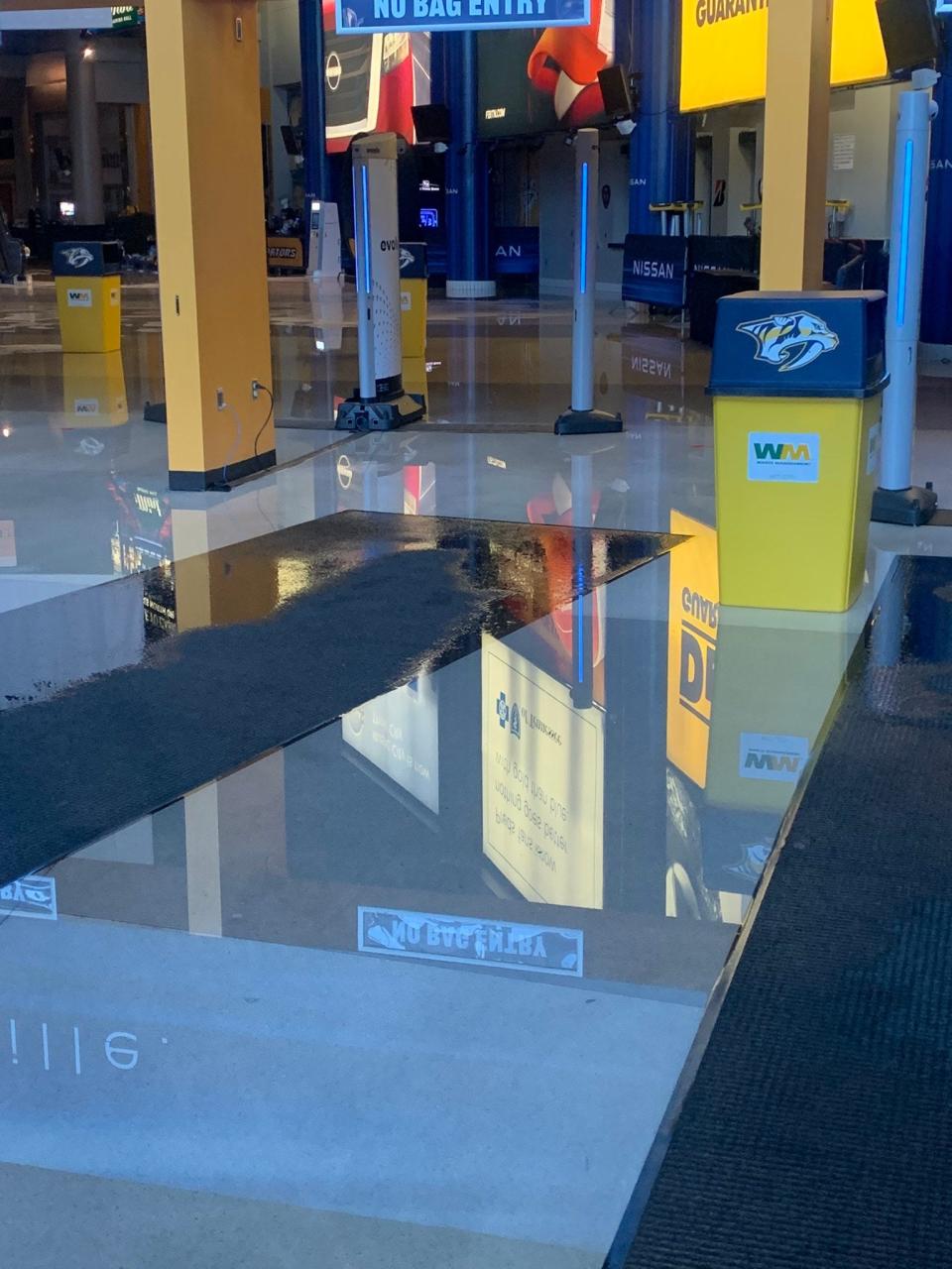 Standing water was visible inside Bridgestone Arena after a water main break early Friday morning.