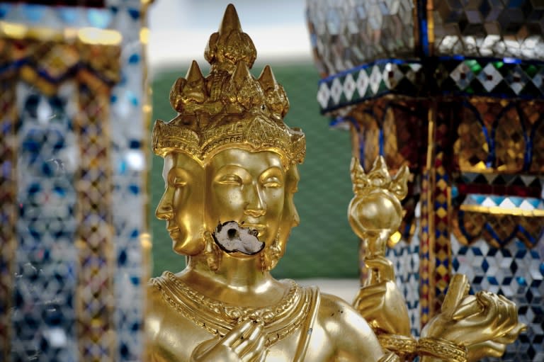 The Brahma statue, which was damaged by a bomb blast, seen at Erawan shrine, a popular tourist site, in central Bangkok, on August 24, 2015