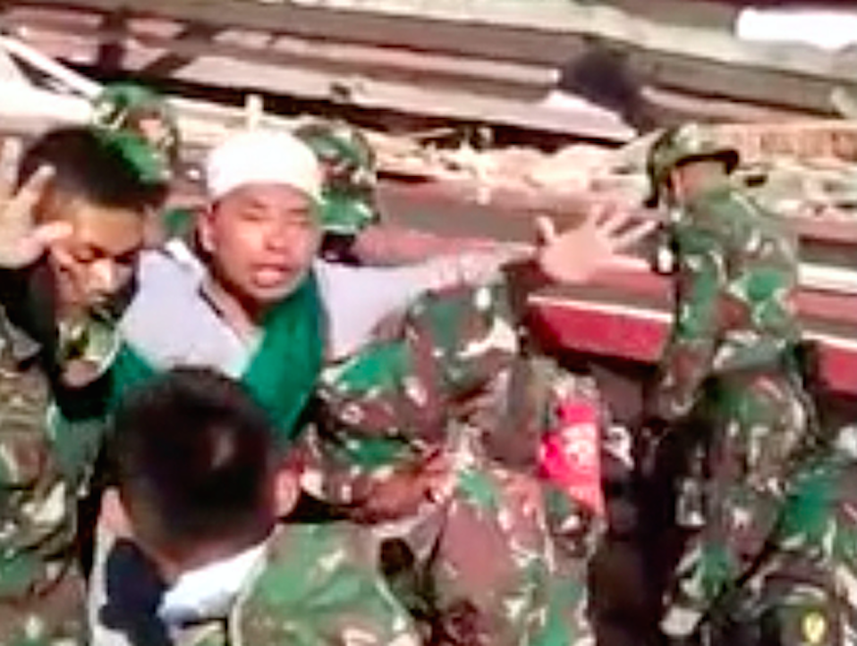 A man was rescued from the rubble of a mosque by the military (Picture: AP)