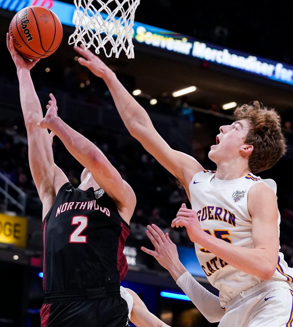 Guerin Catholic Golden Eagles Bryson Cardinal (35) guards NorthWood Panthers forward Ian Raasch (2) on Saturday, March 25, 2023 at Gainbridge Fieldhouse in Indianapolis. The NorthWood Panthers lead at the half against the Guerin Catholic Golden Eagles, 66-63, in the IHSAA Class 3A state finals championship. 