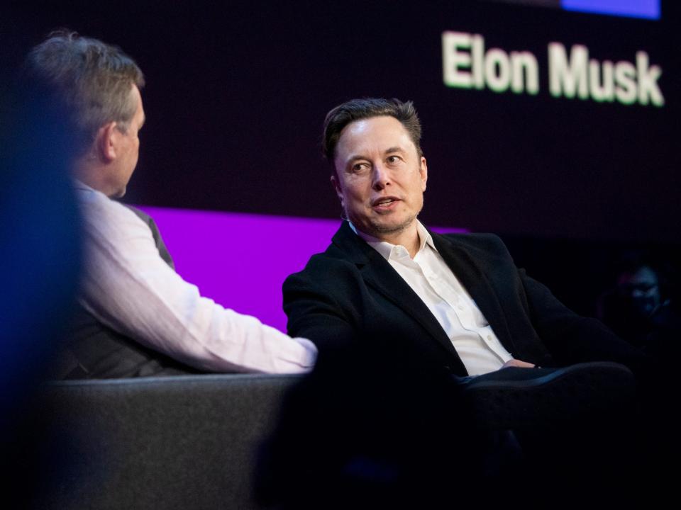 Host Chris Anderson and Elon Musk speak at TED2022: A New Era. April 10-14, 2022, Vancouver, BC, Canada