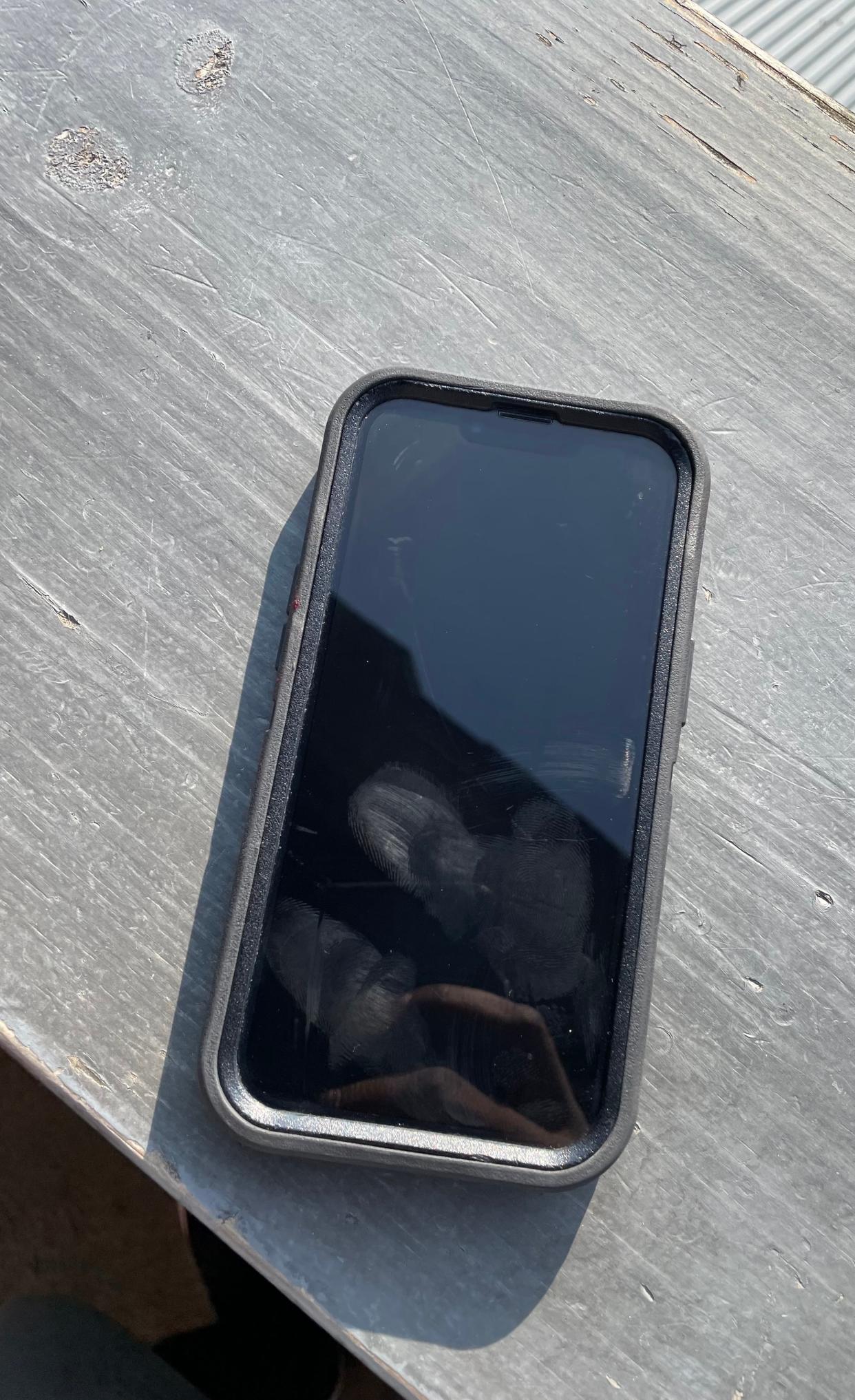 A hint of blood can be seen on the left side of the iPhone that struck David Carter in the head during the Maverick roller coaster at Cedar Point, on Saturday, July 22, 2023.