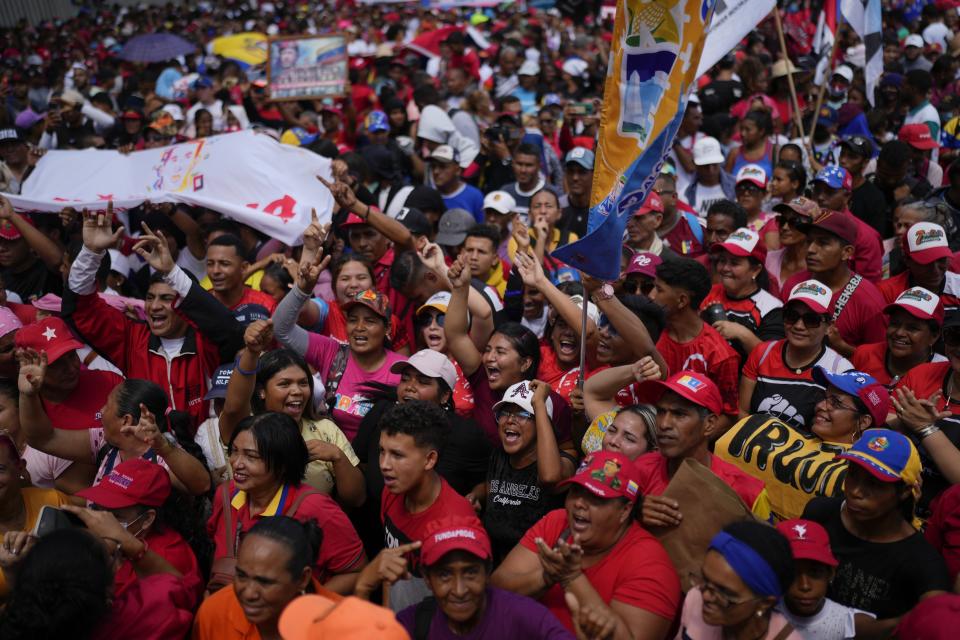 Government supporters rally marking May Day in Caracas, Venezuela, Monday, May 1, 2023. (AP Photo/Ariana Cubillos)