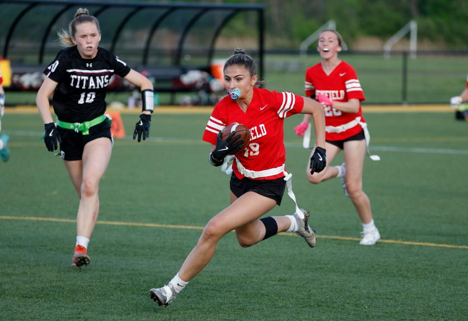 Penfield’s Mallory Pietrzak races to the end zone for a long touchdown reception.