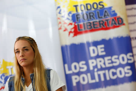 Lilian Tintori, wife of jailed Venezuelan opposition leader Leopoldo Lopez, attends a news conference at the office of the party Popular Will (Voluntad Popular) in Caracas, Venezuela January 18, 2017. The text reads, "All for the freedom of political prisoners". Picture taken January 18, 2017. REUTERS/Carlos Garcia Rawlins