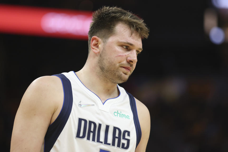 Dallas Mavericks guard Luka Doncic reacts against the Golden State Warriors during the second half of Game 1 of the NBA basketball playoffs Western Conference finals in San Francisco, Wednesday, May 18, 2022. (AP Photo/Jed Jacobsohn)