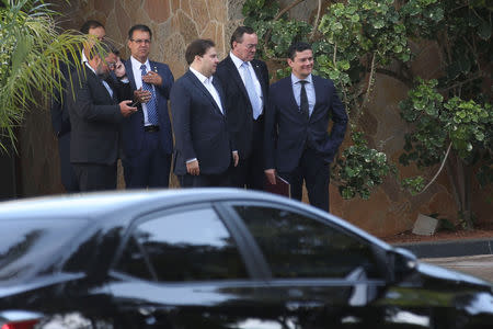 Brazil's Lower House President, Rodrigo Maia and Justice Minister Sergio Moro (R) are seen after a breakfast in Brasilia, Brazil February 4, 2019. Antonio Cruz/Agencia Brasil/Handout via REUTERS