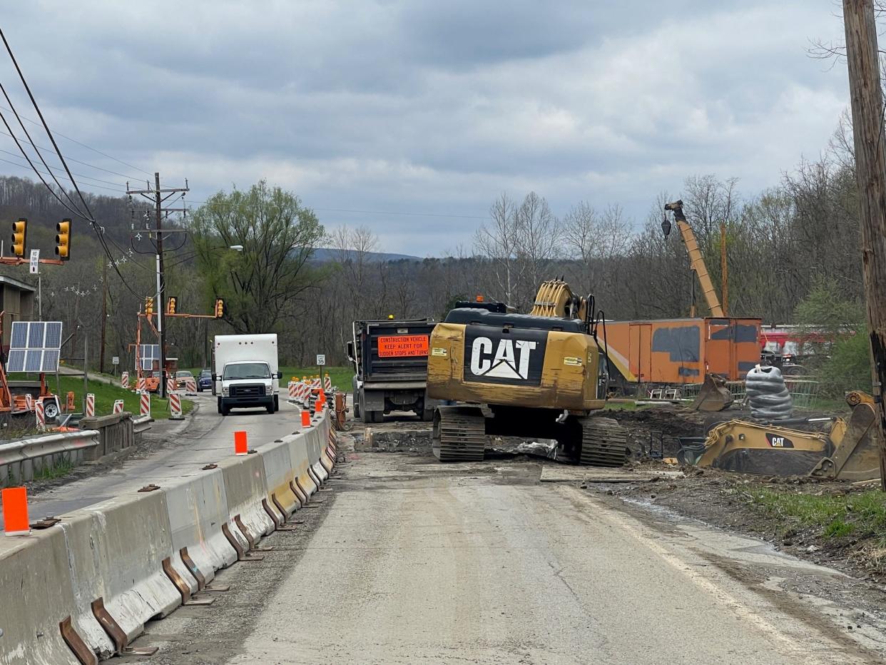 Workers from Plum Contracting, Inc. of Greensburg are replacing a box culvert along Route 403 near the Tire Hill intersection.