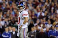 Quarterback Eli Manning #10 of the New York Giants reacts in the first half while taking on the Washington Redskins at FedExField on December 3, 2012 in Landover, Maryland. (Photo by Patrick McDermott/Getty Images)