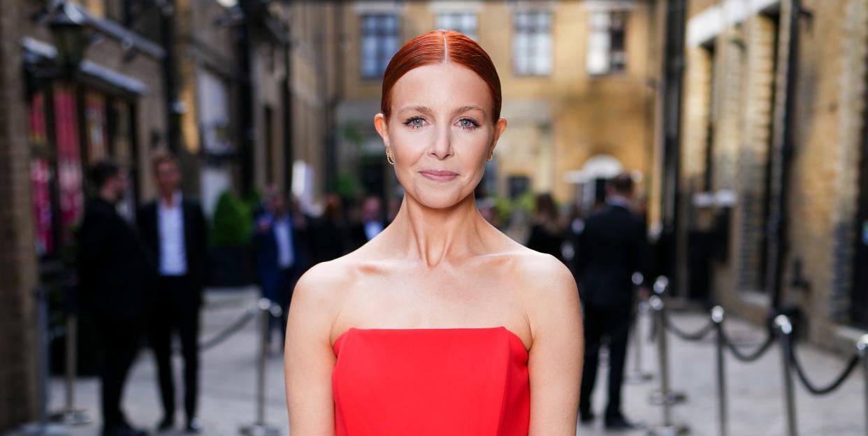 stacey dooley wearing a red dress